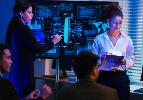 two-tech-professionals-analyzing-digital-data-on-l-2026-07-13-19-09-19-utc (1)